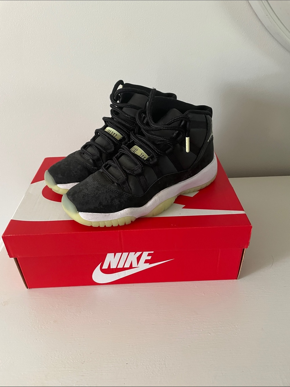 Jordan Kids Black and White High-Top Sneakers with Pale Yellow Outsole